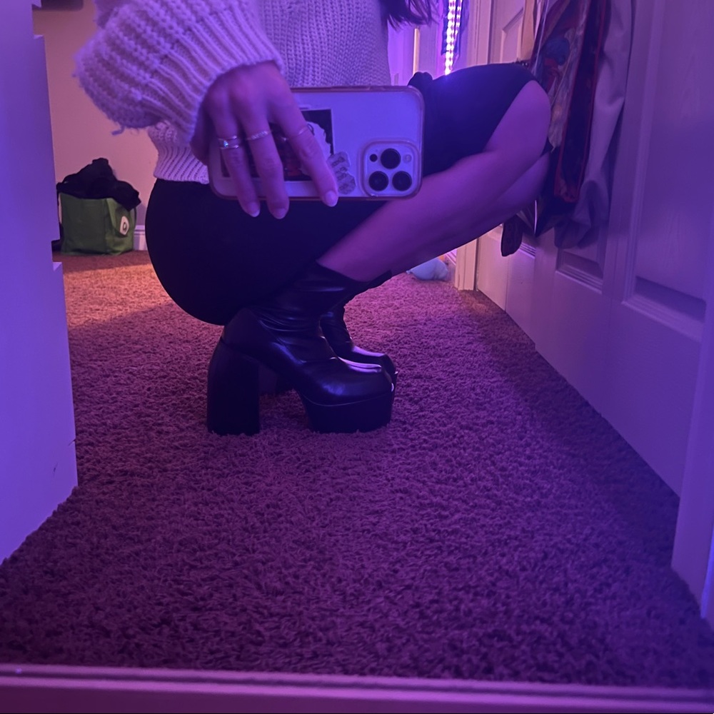 Never worn, Perfect condition, runs slightly big,